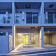 Approach to the building at night