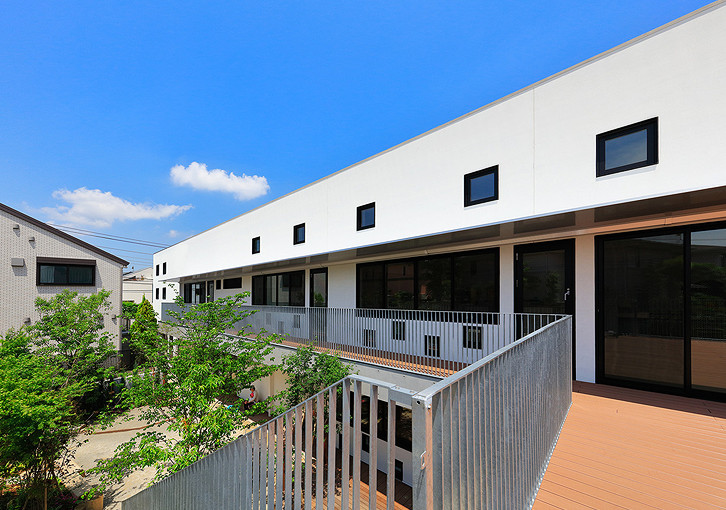 View of the southeast side of the building, seen from the second floor deck