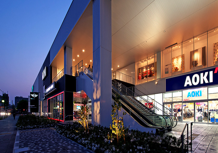 East approach to the building at night